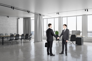 Sticker - Businesspeople shaking hand in meeting room