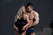 © Jale Ibrak - Healthy Young Couple Flexing Muscles