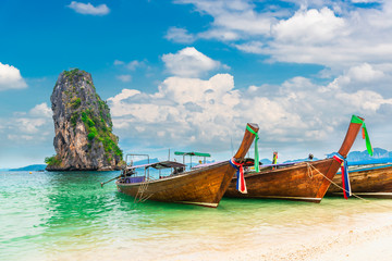 Thai traditional longtail boat on natural sea beach waiting for traveler, Ao Nang beach Krabi, Landmark tourist travel Phuket Thailand summer holiday vacation trips, Tourism beautiful destination Asia