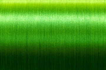 Closed up of green color of thread textured background