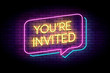 You are invited sign in glowing neon style on a wall. Neon speech bubbles. Vector illustration for marketing or advertisement.