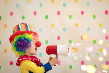 Wall Mural - Funny kid clown playing indoor