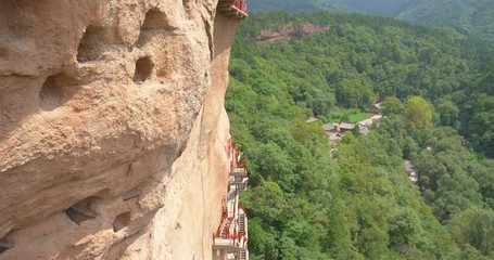 Wall Mural - Maijishan Cave-Temple Complex in Tianshui city, Gansu Province China. A mountain with religious caves on the Silk Road