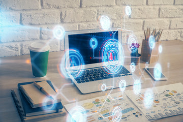 double exposure of desktop computer and technology theme hologram. concept of software development.