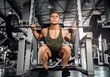 © JonoErasmus - Young attractive muscular gen z body builder doing back squats