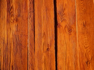 bright brown background of dry wood boards natural aging outdoors