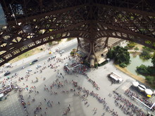 People Queueing To Go Up The Eiffel Tower In Paris