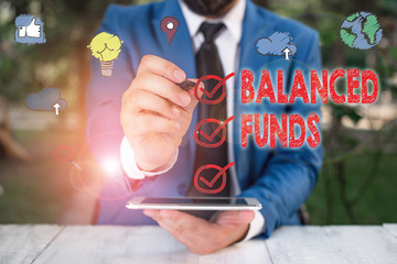 Poster - Text sign showing Balanced Funds. Business photo showcasing hybrid mutual fund that combines different securities
