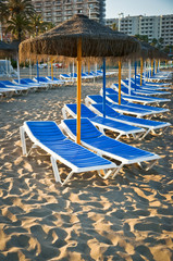 Canvas Print - Sun loungers on a beach in Torremolinos, Malaga, Spain