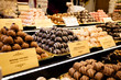 © oksix - Chocolate truffles, candies and sweets at Christmas market