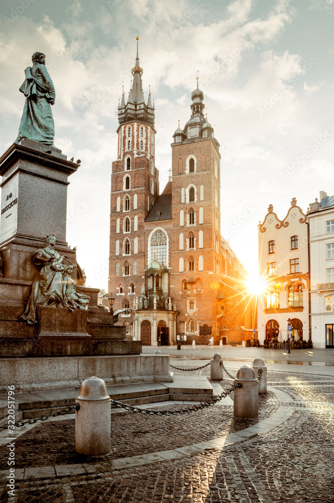 Adam Mickiewicz monument and St. Mary's Basilica on Main Square in Krakow, Poland - obrazy, fototapety, plakaty 