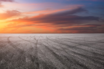 Wall Mural -  Empty asphalt road and sunset sky landscape in summer