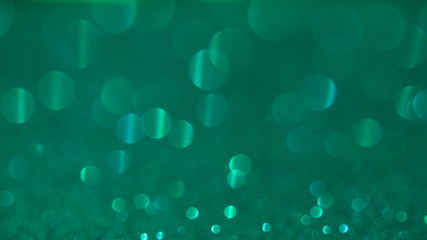 Wall Mural - abstract green teal or turquoise glitter sparkle background .