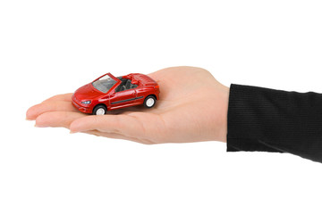 Canvas Print - Hand and toy car