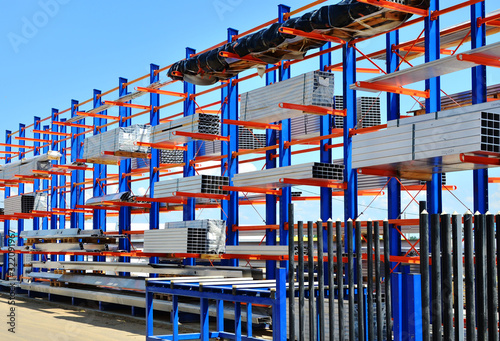 Warehouse Cantilever Racking Systems for storage Aluminum Pipe or profiles. Pallet Rack and Industrial Warehouse Racking. Steel profiles, sheet metal build-profile - Image