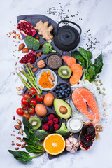 Wall Mural - Assortment of healthy food, superfood ingredients for cooking on table