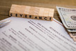 © rabbitti - Severance Pay concept with agreement document on wooden board