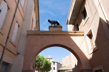 Wall Mural - entrance door city street arch Fortress of Narbonne town in france