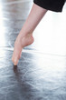 © pressmaster - Bare foot of unrecognizable professional contemporary dancer, vertical close up shot