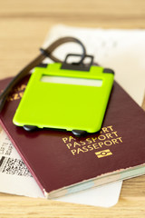 Fototapete - passport with boarding pass and luggage tag. Flying travel concept