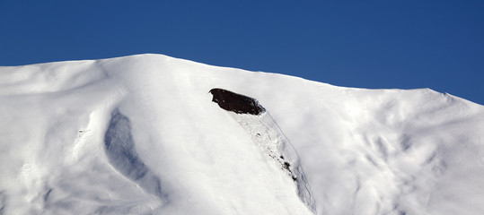  Trace of avalanche on off-piste slope in sunny day