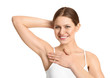 © New Africa - Young beautiful woman showing armpit with smooth clean skin on white background