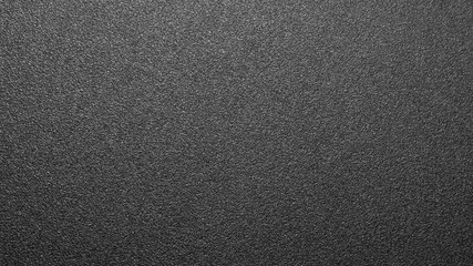 Black rough plastic.The texture is a rough matte plastic.The background is rough black plastic.