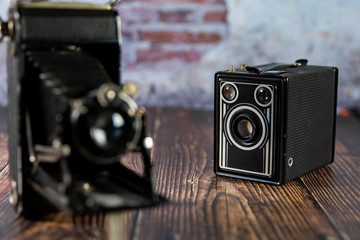 Still life with nostalgic and Box cameras Timeless photography Variety of old antique cameras.