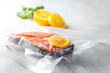 Salmon fillets in a vacuum package. Sous-vide, new technology cuisine.
