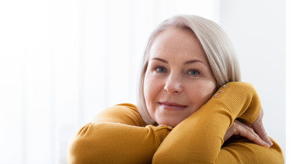 Wall Mural - portrait of beautiful senior woman at home.