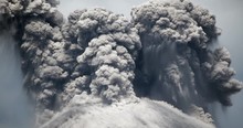 Spectacular Volcanic Eruption. Huge Boulders Are Thrown From The Ash Cloud. Reventador Volcano Erupting In February 2020, Situated In A Remote Part Of The Ecuadorian Amazon Surrounded By Rainforest.