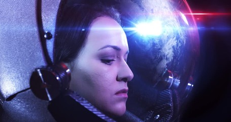 Wall Mural - close up 4k shot of the young beautiful female astronaut in space helmet. she is exploring outer spa