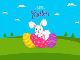 Wall Mural - Happy Easter Concept with Cute Cartoon Bunny and Printed Eggs on Green Nature Sky Background.