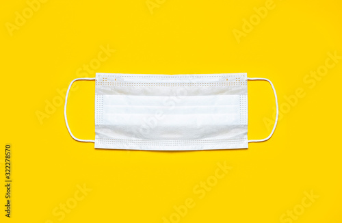Download Medical Mask On Yellow Background Flat Lay Top View With Copy Space Protection Against Virus Coronavirus Flu Colds Diseases Traditional Medical Tool Concept Of Health Medical Background Buy This Stock Photo PSD Mockup Templates