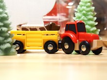 Closeup Shot Of Children's Toys Of Red And Yellow Trucks