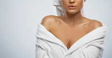 Woman In Bathrobe And Towel Posing.