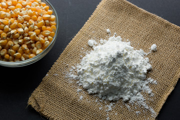 Wall Mural - Close-up of pile corn starch and sweet corn seed