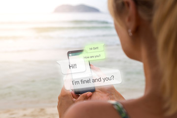 Blonde woman at the beach with smartphone and chat app in the screen. Young woman chatting. Phone application. Millennial. Communications.
