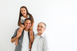 © Angelov - Indian asian family sitting over white background