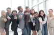 © ASDF - group of happy young business people pointing at you