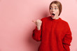 © Drobot Dean - Photo of shocked woman expressing surprise and pointing finger aside