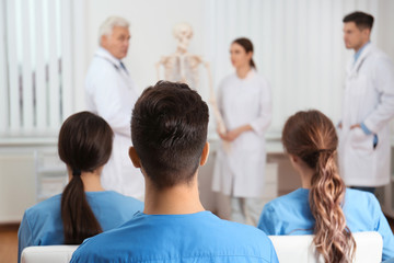 medical students having lecture in orthopedics at clinic