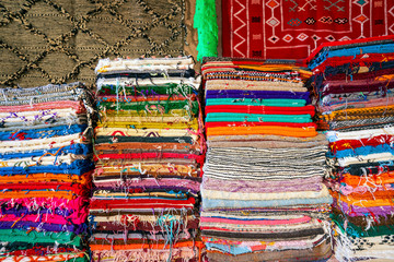 plenty of famous traditional berber carpets on sale, in morocco