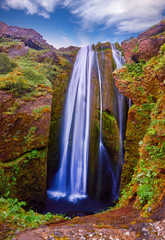 Wall Mural - Unique incredible Gljufrabui waterfall in cave, hidden place. One of the most beautiful waterfalls on the Iceland. Popular and famous tourist attraction summer holiday destination in on South Iceland.