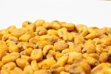 Poster - Roasted corn nuts on white background