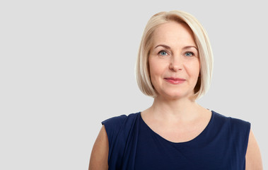 Wall Mural - happy woman portrait. success. isolated over white background.