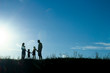 © Kostia - silhouette of a happy family with children