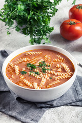 Wall Mural - Tomato soup with fusilli pasta in the bowl