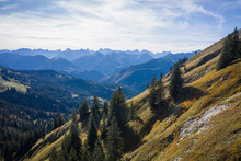 Austria, Tyrol, Eben Am Achensee, Scenic View Of Green Forested Mountain Valley In Autumn