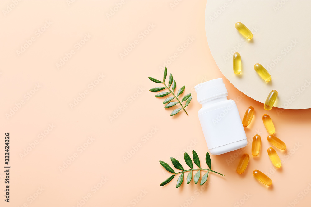 Fish oil vitamin capsules on light color background - obrazy, fototapety, plakaty 